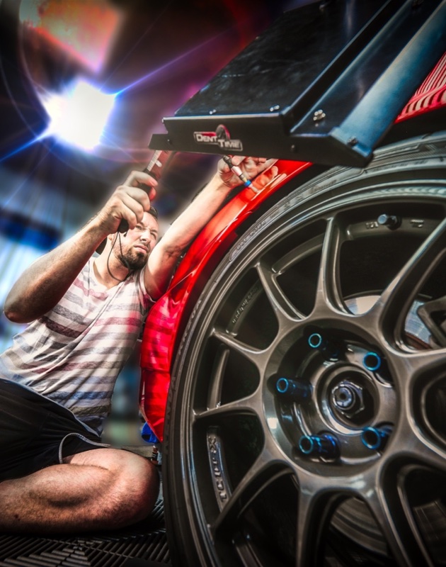 Myke Toledo at work — PDR craftsman since 1991